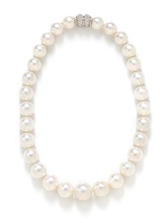 * A White Gold, Diamond and Graduated Cultured South Sea Pearl Necklace,