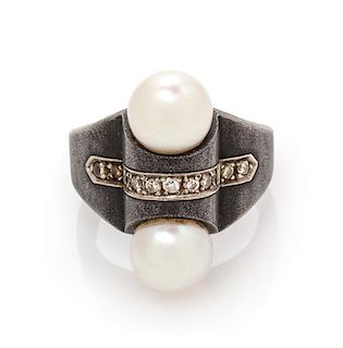 * An Art Moderne Blackened Steel, White Gold and Cultured Pearl Ring, Marsh & Co., 16.20 dwts.
