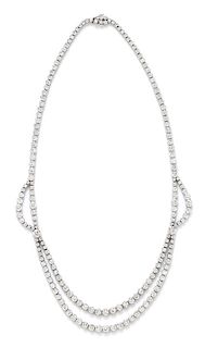 A White Gold and Diamond Swag Necklace, 36.15 dwts.