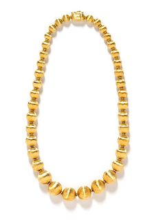 An 18 Karat Yellow Gold Graduated Bead Necklace, OWC, 40.20 dwts.