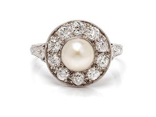 An Edwardian Platinum, Pearl and Diamond Ring, 3.20 dwts.