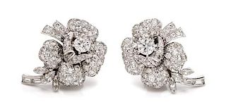 A Pair of Platinum and Diamond Floral Motif Earclips, 9.90 dwts.
