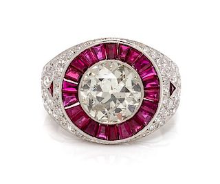 A Platinum, Diamond and Ruby Ring, 5.60 dwts.
