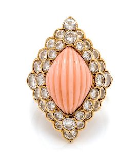 An 18 Karat Yellow Gold, Angel Skin Coral, and Diamond Ring, Andre Vassort for Boucheron, 6.70 dwts.