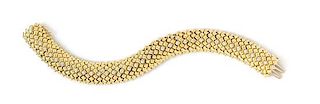 * An 18 Karat Yellow Gold and Diamond Bracelet, Flaircraft, 59.70 dwts.
