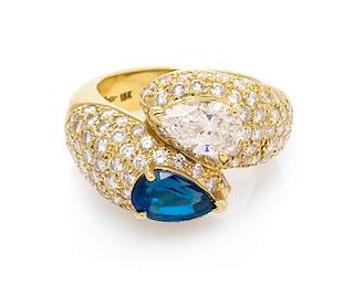 A Vintage 18 Karat Yellow Gold, Sapphire and Diamond Bypass Ring, Cartier, 9.40 dwts.