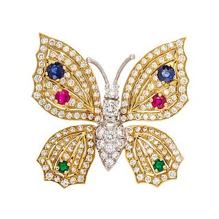 A Platinum, 18 Karat Yellow Gold, Diamond, Ruby, Sapphire and Emerald Butterfly Brooch, 7.70 dwts.