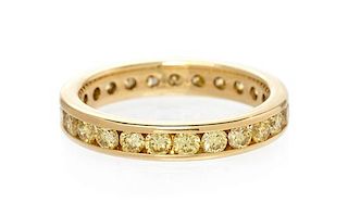 A Yellow Gold and Colored Diamond Eternity Band, 2.55 dwts.