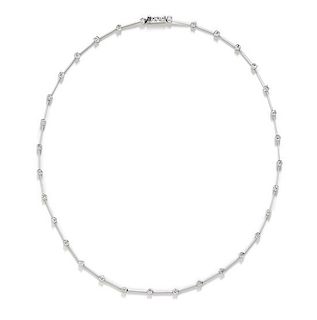 * An 18 Karat White Gold and Diamond Necklace, Peter Storm, 9.70 dwts.
