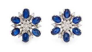 A Pair of 18 Karat White Gold, Sapphire and Diamond Cluster Earrings, 8.40 dwts.