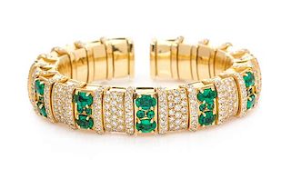 An 18 Karat Yellow Gold, Emerald and Diamond Flexible Cuff Bracelet, 65.65 dwts.