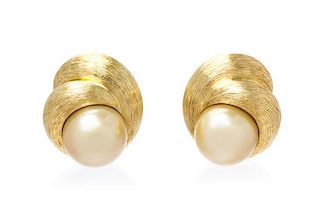 A Pair of 18 Karat Yellow Gold and Cultured Golden South Sea Pearl Earclips, Henry Dunay, 22.90 dwts.