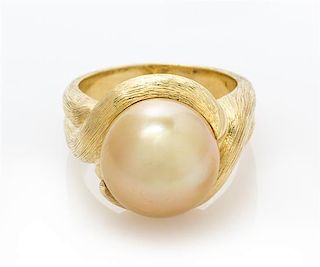 An 18 Karat Yellow Gold and Cultured Golden South Sea Pearl Ring, Henry Dunay, 11.90 dwts.