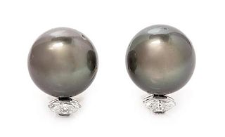 A Pair of Platinum, Cultured Tahitian Pearl and Diamond Earclips, 10.35 dwts.