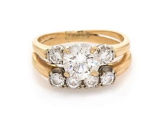 * A 14 Karat Bicolor Gold and Diamond Ring, 3.90 dwts.