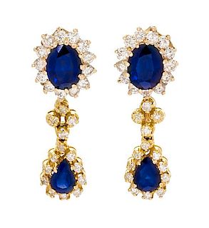 * A Pair of Yellow Gold, Sapphire and Diamond Convertible Day/Night Earrings, 7.80 dwts.