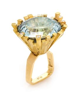 An 18 Karat Yellow Gold, Blue Topaz and Diamond Ring, Andrew Grima, Circa 1969, 23.60 dwts.