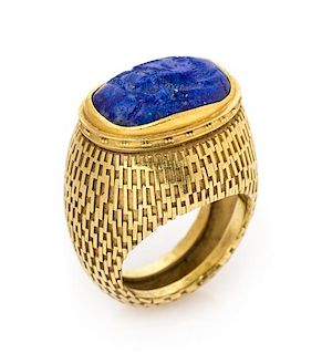 An 18 Karat Yellow Gold and Lapis Lazuli Intaglio Ring, John Paul Miller, 13.50 dwts.