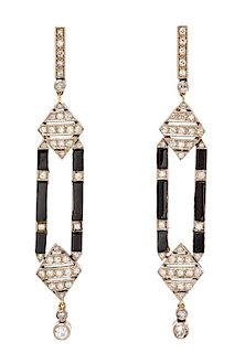 A Pair of Art Deco Platinum, Diamond and Onyx Drop Earrings, 8.40 dwts.