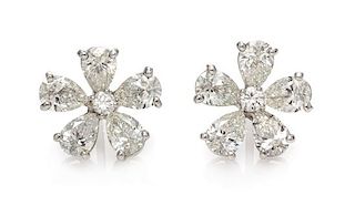 A Pair of 18 Karat White Gold and Diamond Flower Earrings, 2.45 dwts.