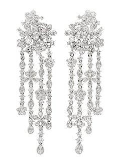A Pair of 18 Karat White Gold and Diamond Floral Cluster Fringe Earclips, 12.90 dwts.