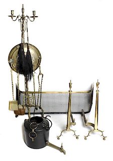 An Assembled Collection of Brass Fireplace Equipment, Height of tallest 53 1/2 inches.