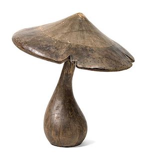 A Wood Model of a Mushroom Height 40 inches.