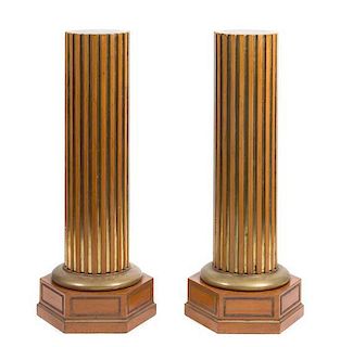 A Pair of Parcel Gilt Pedestals Height 48 inches.