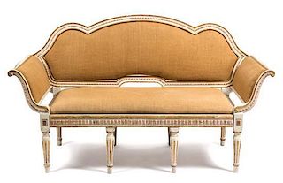 An Italian Painted and Parcel Gilt Daybed Height 41 x width 70 x depth 30 inches.