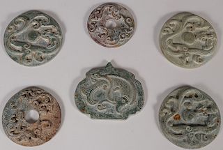 FIVE CHINESE CARVED HARDSTONE DISCS
