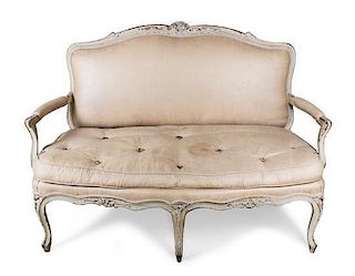 A Louis XV Style Painted Settee Height 39 x width 56 x depth 25 inches.