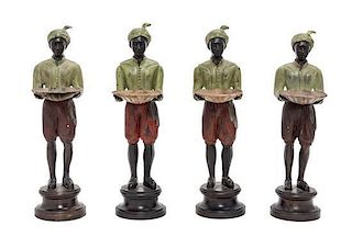 A Set of Four Polychromed Cast Metal Figures Height 11 1/4 inches.