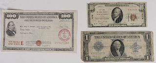 A GROUP OF US PAPER CURRENCY AND A WAR BOND