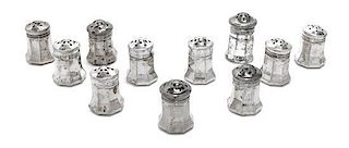 A Group of Eleven Silver Small Casters, Cartier, Late 20th Century, all with paneled sides, comprising 7 smaller casters and fou