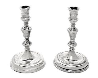 A Pair of American Silver Candlesticks, Cartier, New York, 20th Century, with knopped stems,