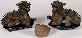 A PAIR OF CHINESE CERAMIC FOO DOGS