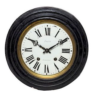 A French Ebonized Wall Clock Height 14 3/4 inches.