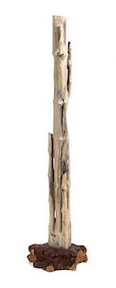 A Petrified Bamboo Garden Ornament Height 60 inches.