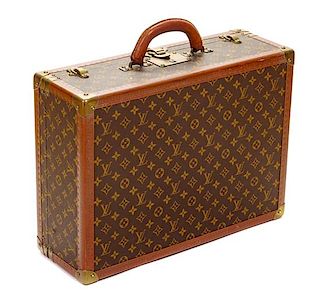 A Louis Vuitton Monogram Canvas Bisten Suitcase, 14"H x 19"W x 6.5"D; Handle drop: 2".