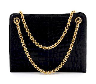 A Gucci Black Crocodile Handbag, 9.5" x 7.5" x 2.5"; Strap drop: 5.5".