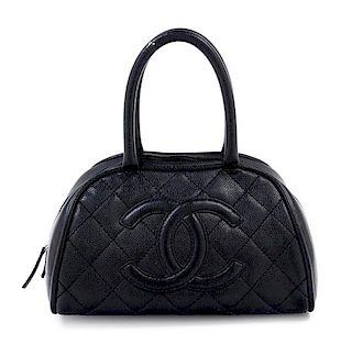 A Chanel Black Caviar Quilted Bowler Bag, 10.5" x 6.5" x 7"; Handle drop: 5".