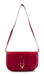 A Gucci Red Leather Flap Handbag, 10.5: x 7" x 1"; Strap drop: 15.5".
