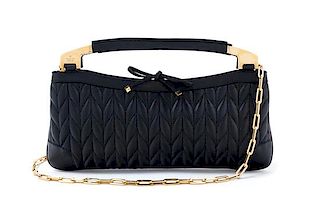 * A Gucci Black Leather Quilted Rectangular Handbag, 13" x 6" x 1"; Handle drop: 1.5".