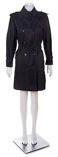 A Burberry Black Double Breasted Trench Coat, Size 14.
