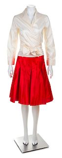 A Carolina Herrera Red Silk Skirt and Cream Silk Blouse, No size.