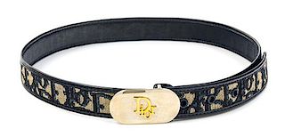 A Christian Dior Navy Logo Belt, 27.25"- 31.25" x 1".