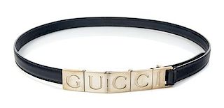 A Gucci Navy Leather Narrow Belt, 28"- 30" x .5".
