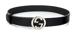 A Gucci Black Leather Belt, 30.25"- 32.25" x 1".