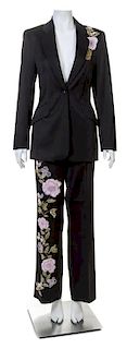 An Escada Black Wool Embroidered Pant Suit, Jacket 38; Pant 40.