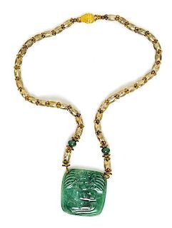 * An Opaque Green Hardstone Carved Pendant Necklace, 28"; Pendant: 2.5" diameter.